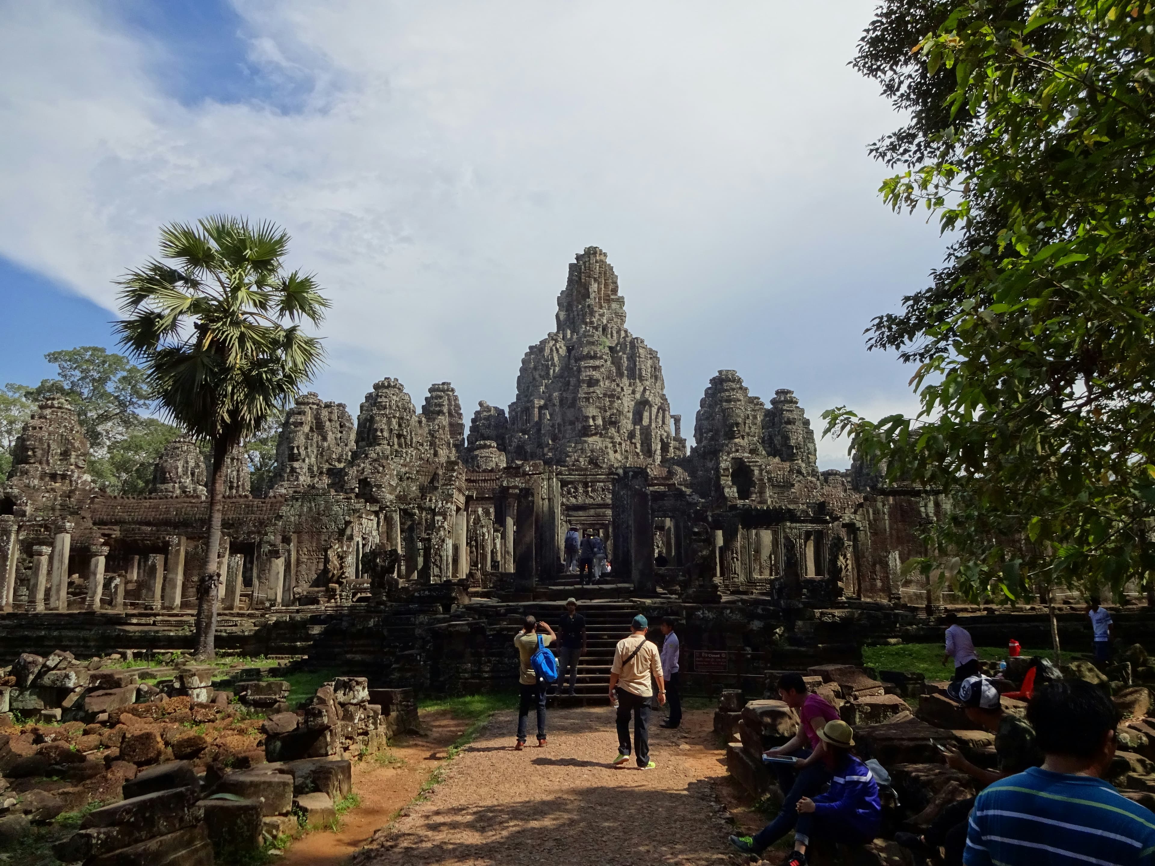 Visitors before a temple in Cambodia