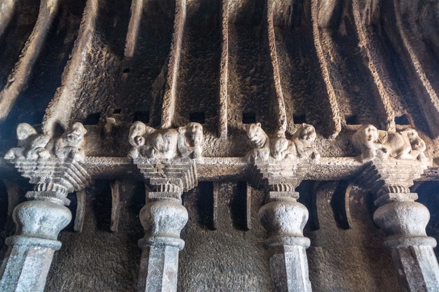 Pillar capitals inside the Lenyadri chaitya