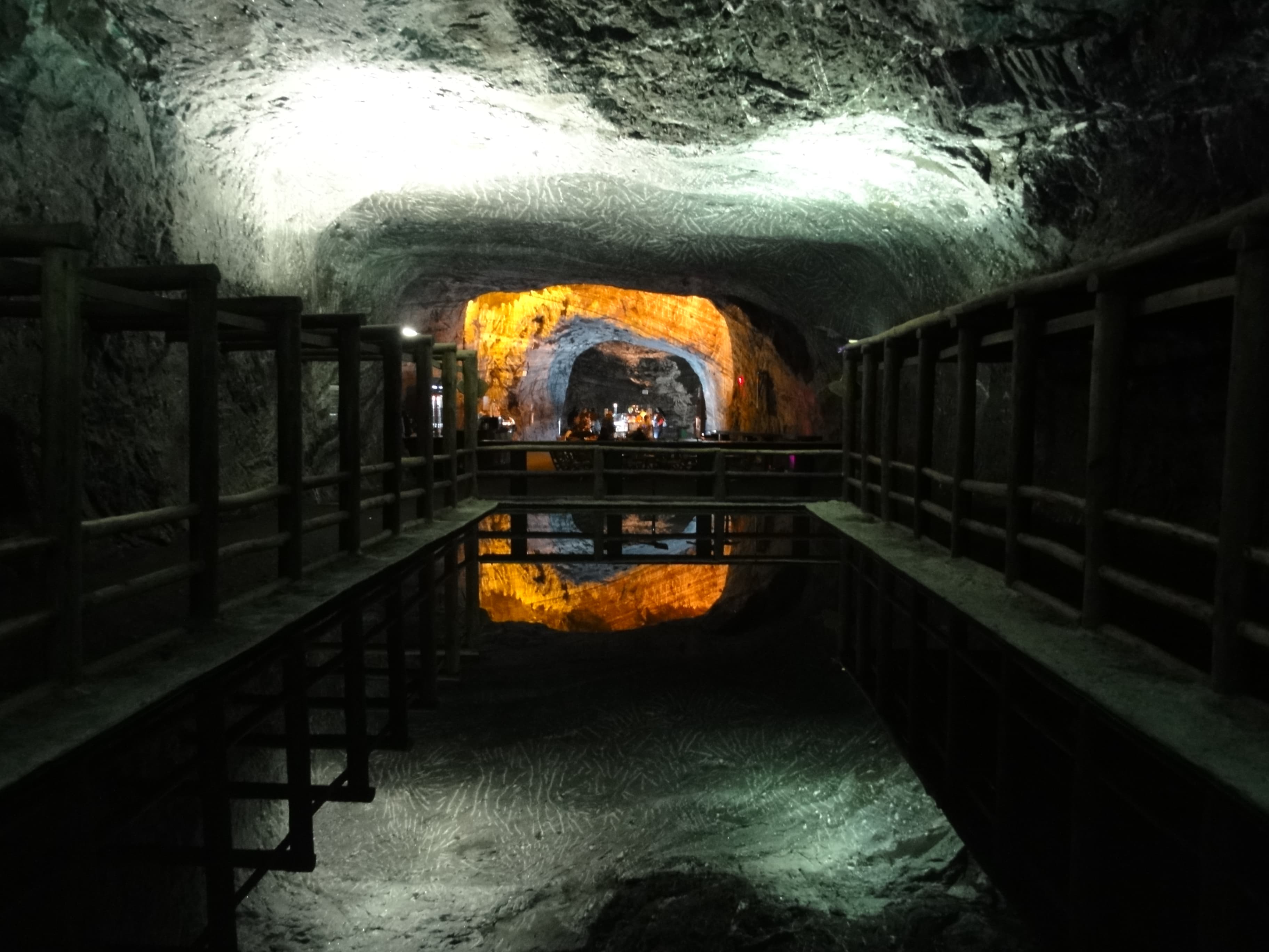 Brine water mirror reflecting salt rock in Zipaquirá