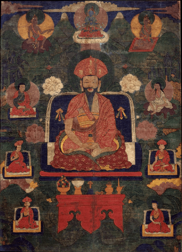 Center: Shabdrung Ngagwang Namgya. Above: primordial Buddha Vajradhara. Left: mahasiddha Tilopa with a fish. Seated right: Naropa. Sides: monks,lamas, and a yogi in a white robe.
Ground Mineral Pigment on Cotton. Collection of Rubin Museum of Art.