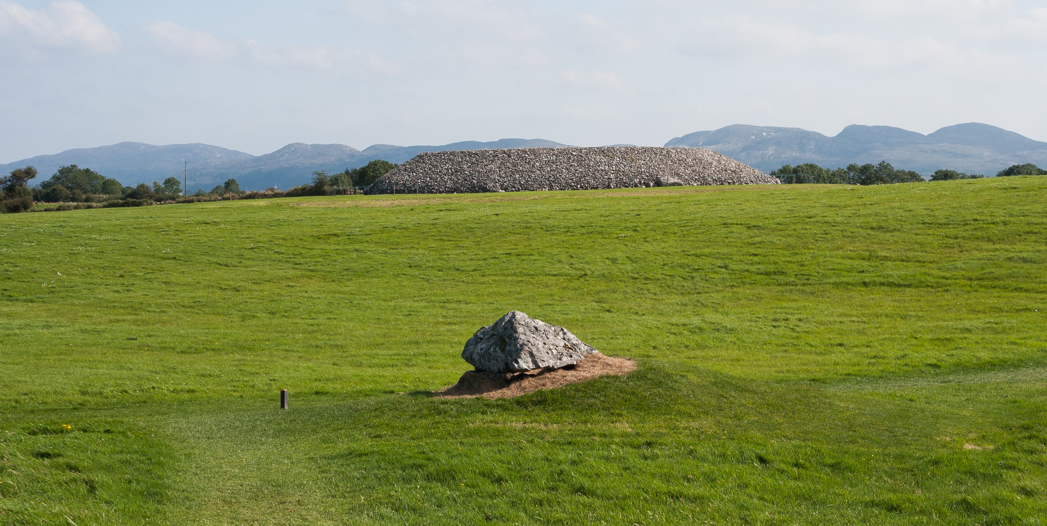 Megalithic structure P52 with the cairn of P51 in the background.